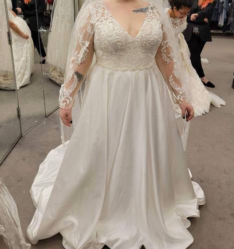 Oleg Cassini long sleeve satin applique wedding dress