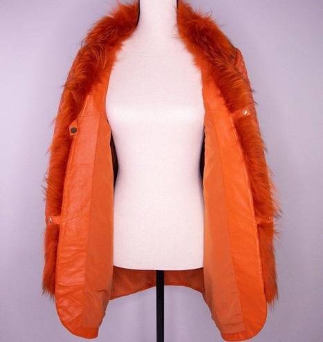 Vintage leather coat with fur trim, color orange Size XS