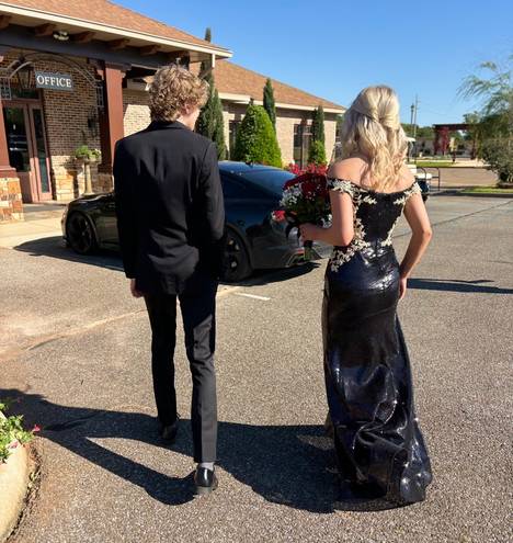 Scarlett Portia and  Black And Gold Gown