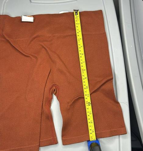 Gilly Hicks #7  size large burnt orange spandex b8