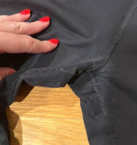 Lululemon  size 6 black leggings-pilling noted on butt and groin area price as is