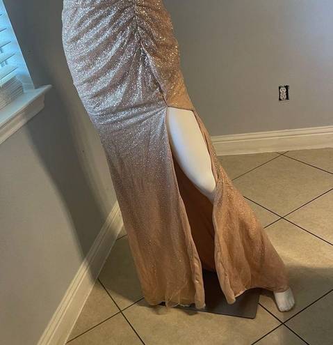 Cinderella Divine Women’s formal sparkly dress size 4
Brand is 
Rose gold color