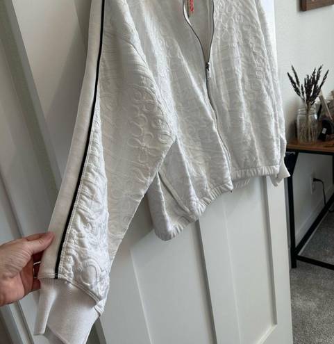 Free People Movement Fp movement by Free People white embroidered zip up jacket with black stripe Lg