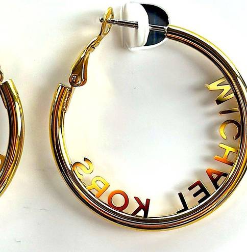 Michael Kors  | GOLD TONE MEDIUM SIZE LOGO HOOP EARRINGS