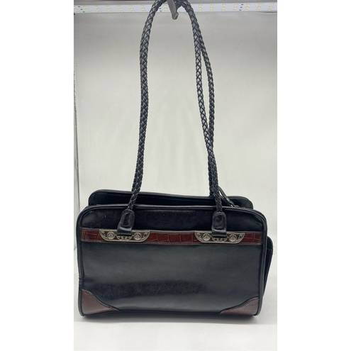 Bueno  Handbag black with lots of pockets all over the handbag. Braided shoulder