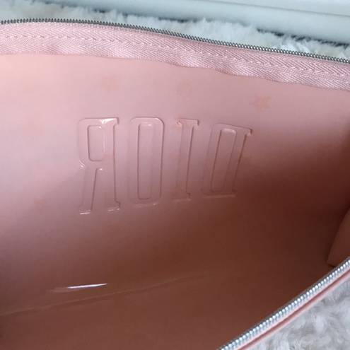 Dior Make up bag in light pink, zipper pull has the D logo