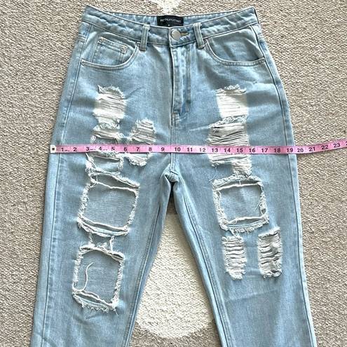 Pretty Little Thing  Kendall Light Wash Super Distressed Mom Jeans