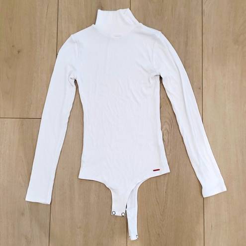 n:philanthropy  Brooke Turtleneck Bodysuit in White