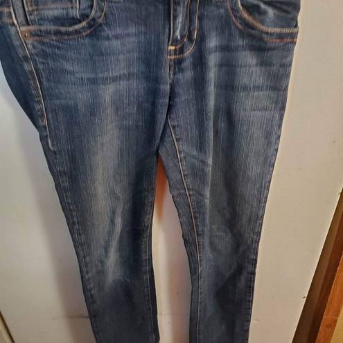 Guess  jeans size 27 skinny leg waist 30 inches inseam 31 inches distressed