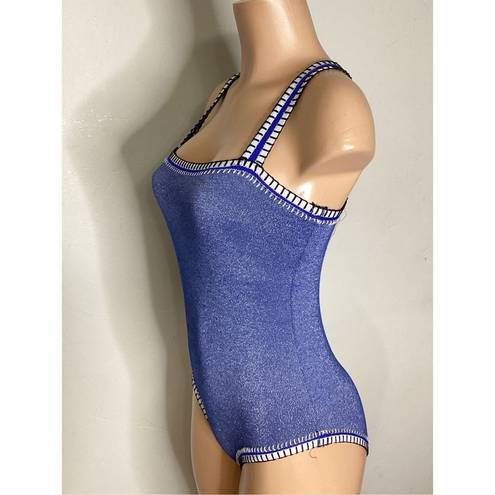 PilyQ New.  Platinum silver blue crochet one piece. Size small. Retails $168