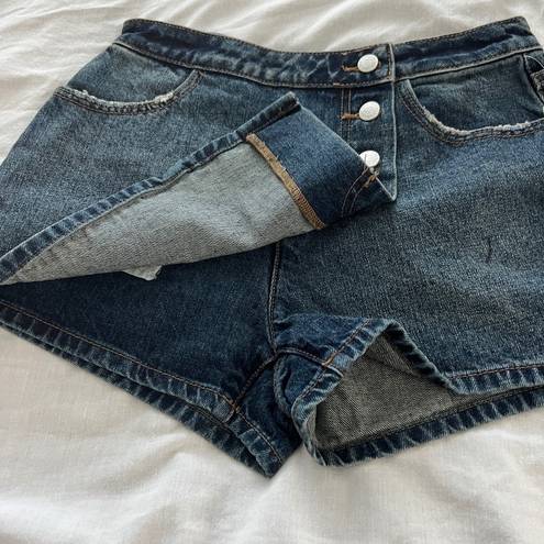 Urban Outfitters denim skort Size 26 Condition: NWT  Color: Blue   Details : - Button down front  - Hidden button and zipper closure  - Comfy  Extras: -  I ship between 1-2 days 