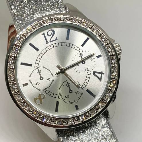 FMD women’s watch silver tone rhinestones Quartz analog 38mm leather band runnin