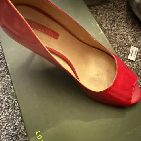 Longchamp  Beautiful red patent leather pumps.