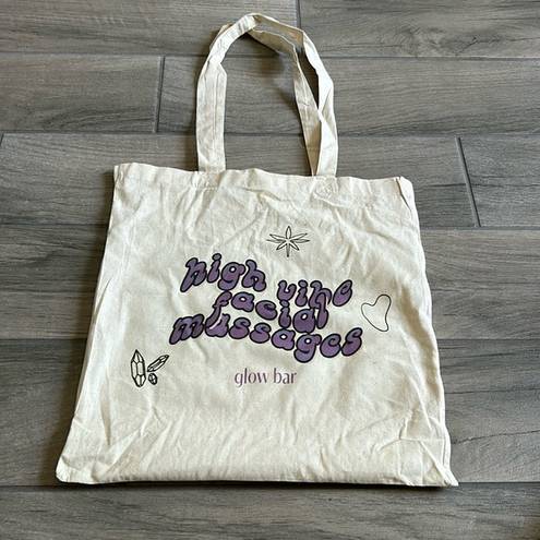 The Bar High vibe facial massages glow canvas tote