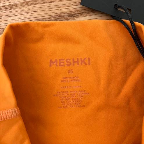 Meshki Orange Leggings