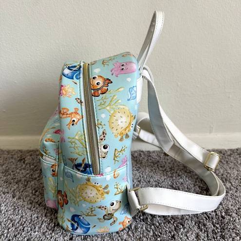 Lounge Fly  Disney Pixar Find Nemo Collage Mini Backpack in Light Blue