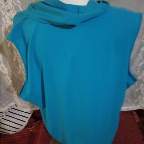 Nike  size small dry fit turquoise topbust 36 inches length 25 “short sleeve