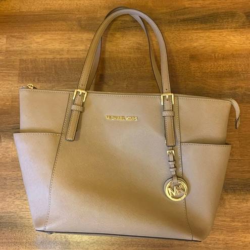 Michael Kors  beige/taupe leather jet set tote handbag purse.