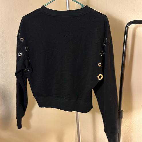 Good American  grommet sweater size 0 or XS slightly cropped but hangs at waist