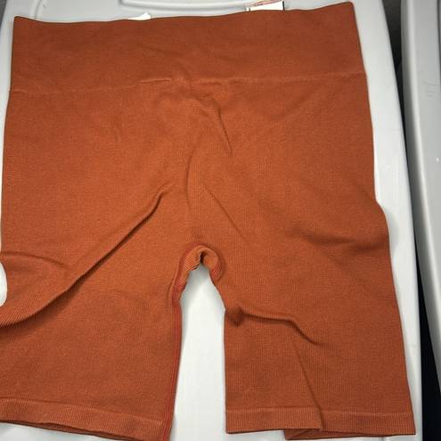 Gilly Hicks #7  size large burnt orange spandex b8