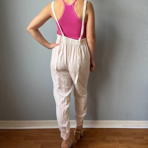 Free People Movement  One Piece Split Rock Jumpsuit in Ivory Size Small