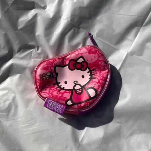 Sanrio 2000s  Hello Kitty 2013 coin purse
Has some bubbles under the material