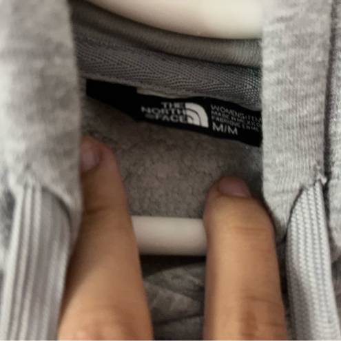 The North Face  gray sweatshirt