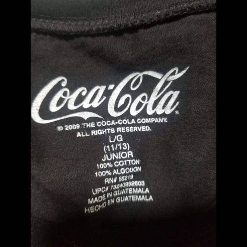 Coca-Cola  black tee shirt. Size Junior L. 15-17. Sort sleeve. 100% cotton