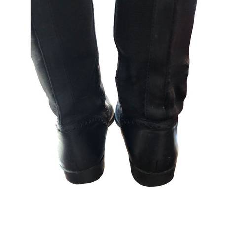 Ann Taylor  Loft black leather riding boot with stretch band in back. Pull on siz