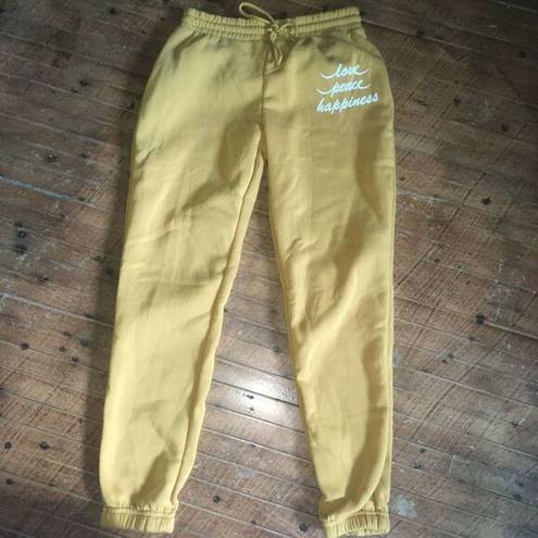 Brooks Bobbie  S mustard peace love happiness joggers