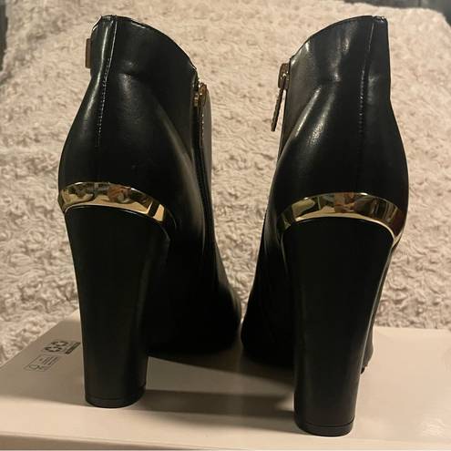 Guess Woman’s Booties  size 9