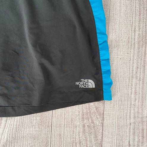 The North Face women L golf/tennis skort grey & blue