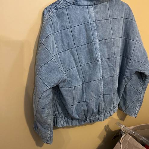 easel  medium blue jacket