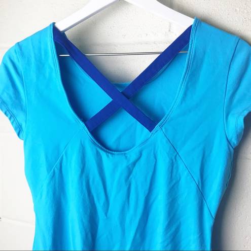 Lucy Activewear  Women's Bright Blue Cross Back Short Sleeve Fitted Workout Top