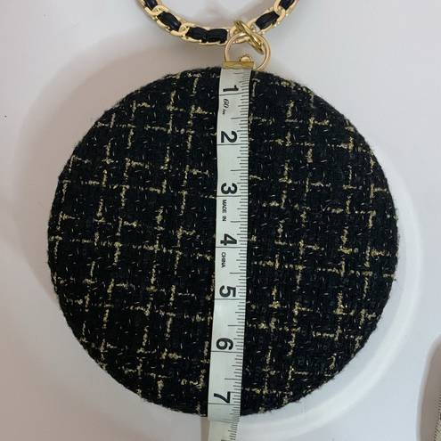 BLACK AND GOLD TWEED HARD CASE PURSE WITH BLACK LEATHER WEAVE BRACELET HANDLE