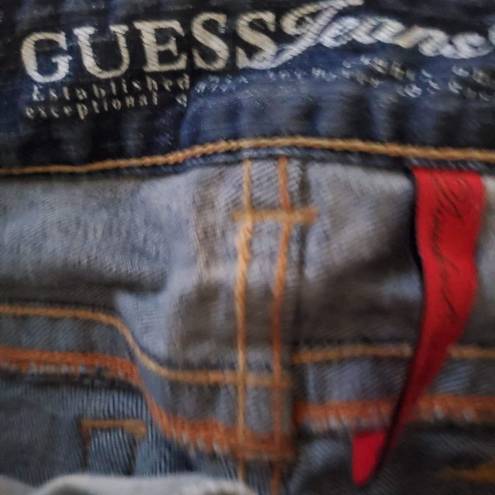 Guess  jeans size 27 skinny leg waist 30 inches inseam 31 inches distressed