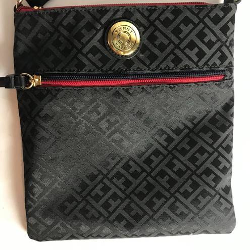 Tommy Hilfiger  Crossbody purse bag in black w/ red accents.  Excellent Condition