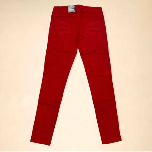 Tripp NYC  Z-Cut Strappy Skinny Jeans In Red