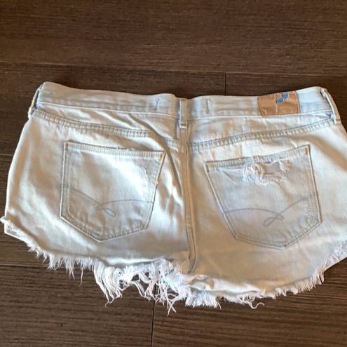 Gilly Hicks Light wash distressed jean shorts