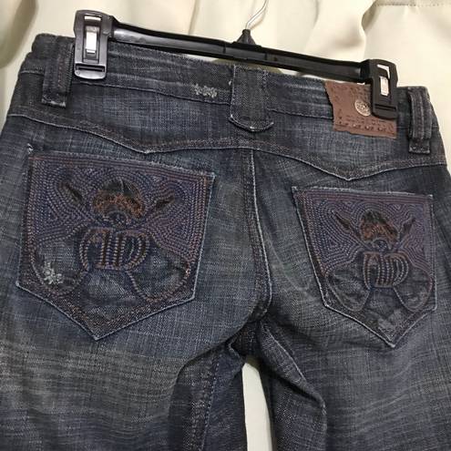 Antik Denim Distressed Embroidered Pocket Flared Leg Jeans