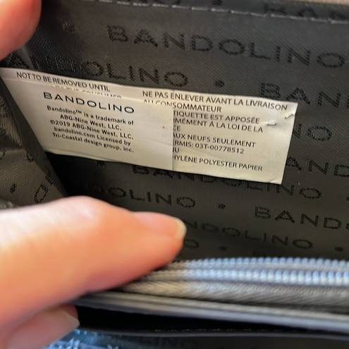 Bandolino wallet. Good used condition. Plenty of room for credit cards, cash,etc