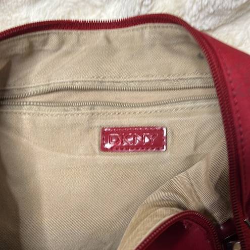 DKNY  red monogram purse. Shoulder bag. Some cracking on inside of strap