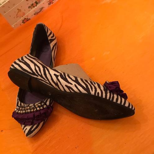 Guess  Zebra w/purple bow