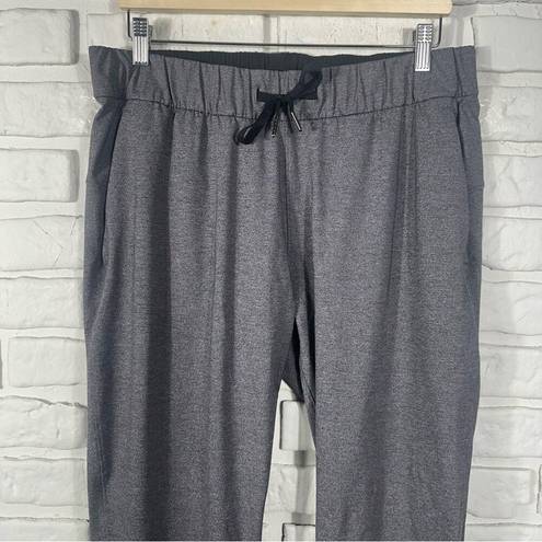Lululemon  On The Fly Pant in Heather Black Size 10