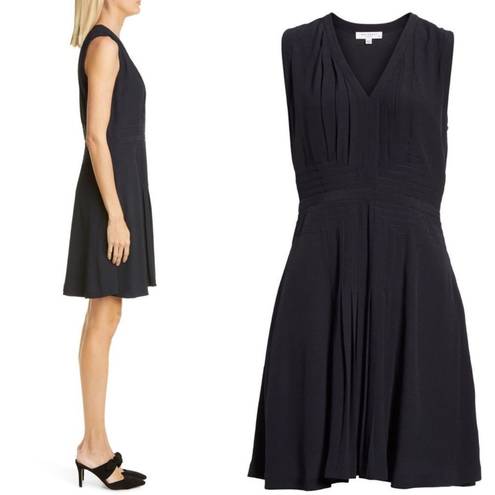 Equipment New.  black pleated dress. Normally $450. Size 2