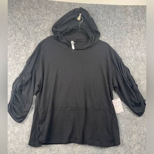Free People Movement  3/4 sleeve womens hooded shirt New with tags.