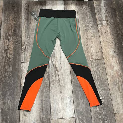 Kimberly NWT  Color Block Green Orange Black Leggings Size Medium