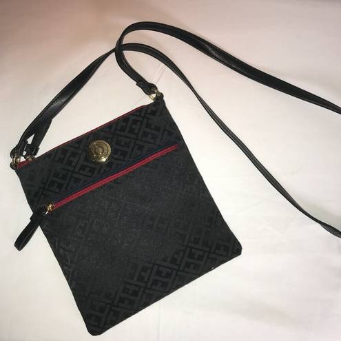 Tommy Hilfiger  Crossbody purse bag in black w/ red accents.  Excellent Condition