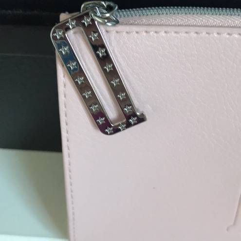 Dior Make up bag in light pink, zipper pull has the D logo