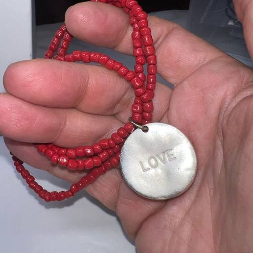 The Row Triple Red Beaded Stretch Love Charm Bracelet